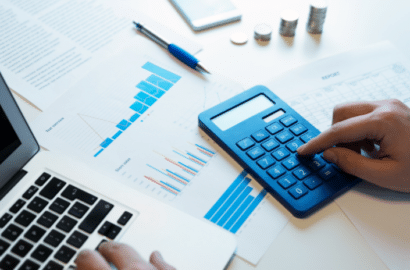 Image of Calculator on desk with papers